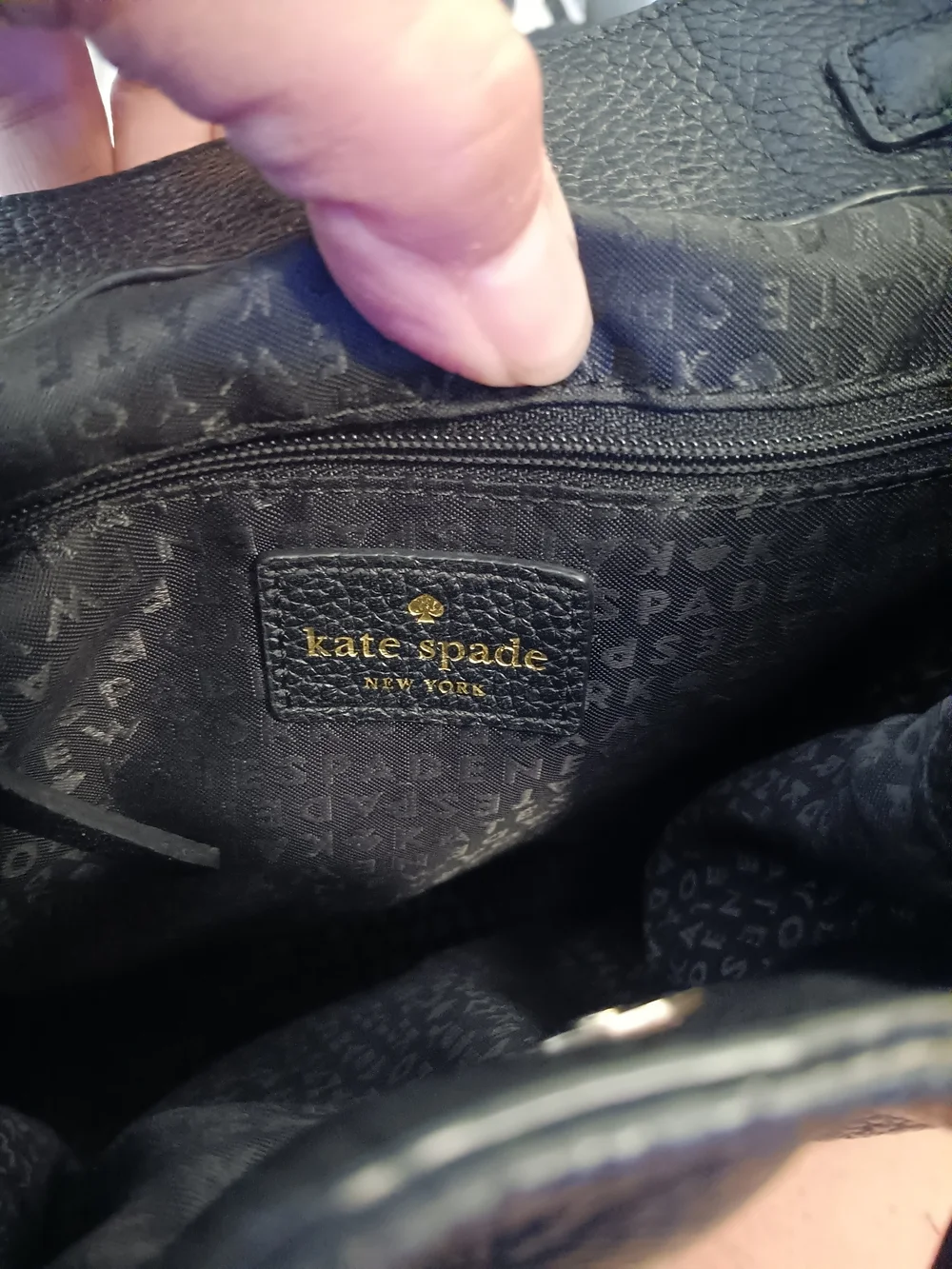 kate spade Black Pebbled Leather Drawstring Backpack